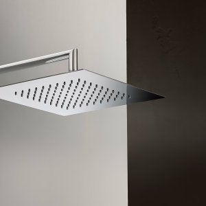 صنابير تصميم إيطالية للحمّام: خلاط Mint من Fantini بجانب مغسلة موضوعة على السطح